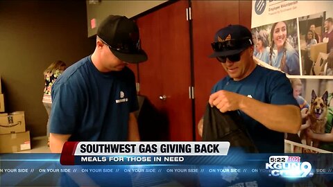 Southwest Gas employees hand out meals to homeless