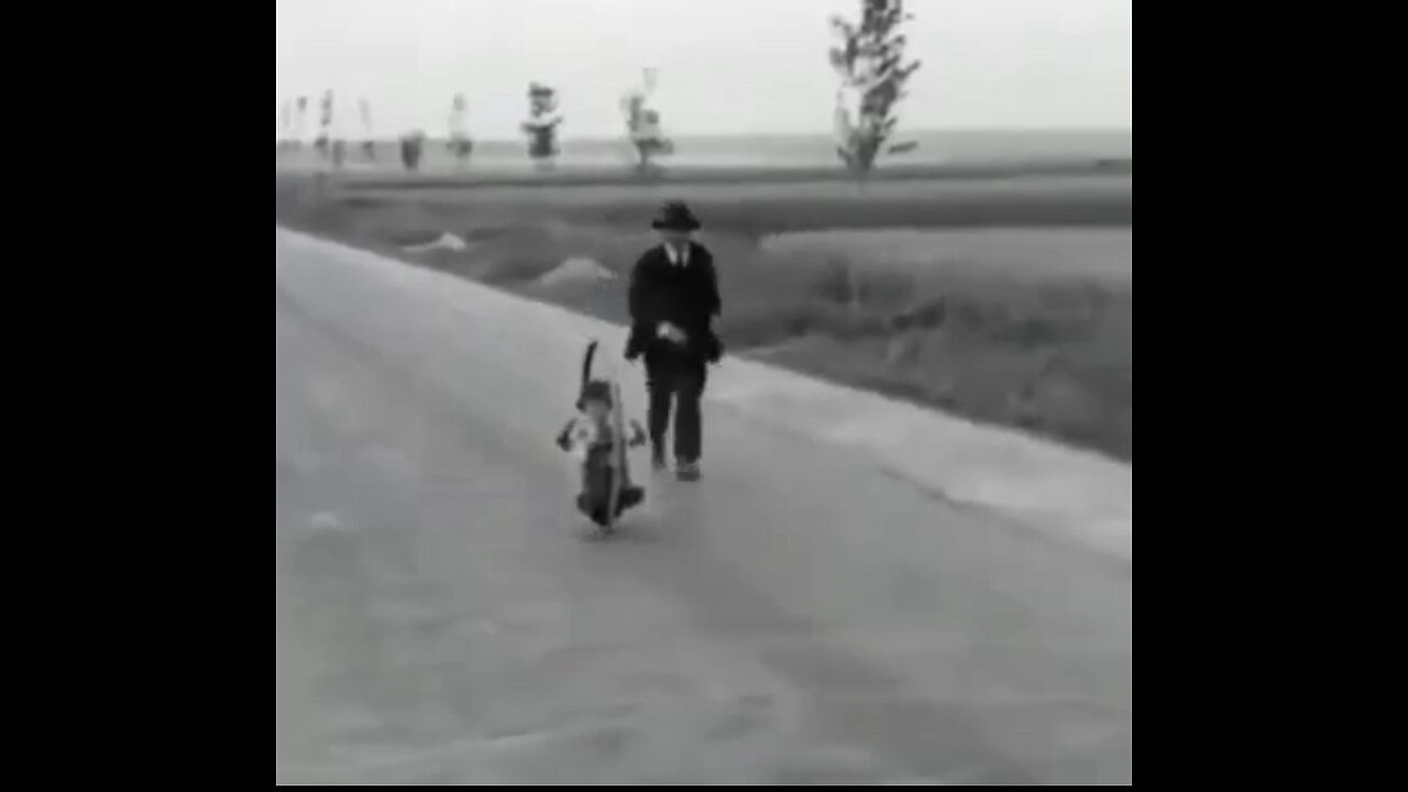 Child riding a monocycle back in the early 1900s, our history is a lie