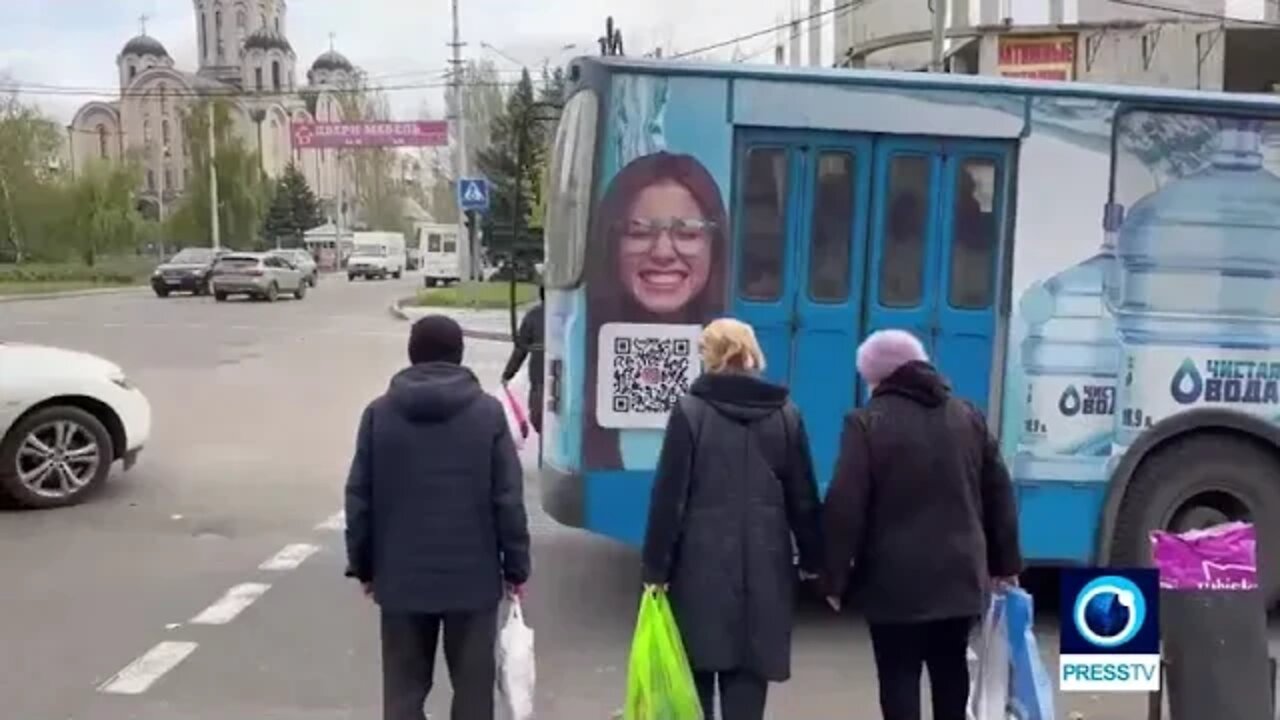 Johnny Miller speaks to locals in Donbass