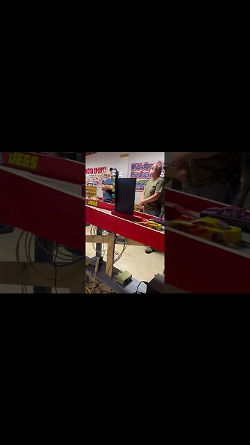 Father and Son Square Off at the Slot Car Drags. Who wins?