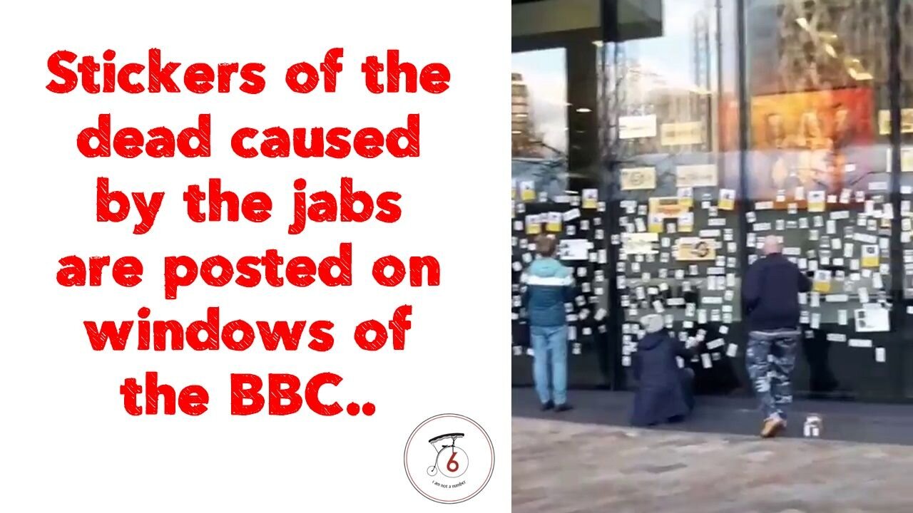 Stickers of the dead caused by the jabs are posted on windows of the BBC.