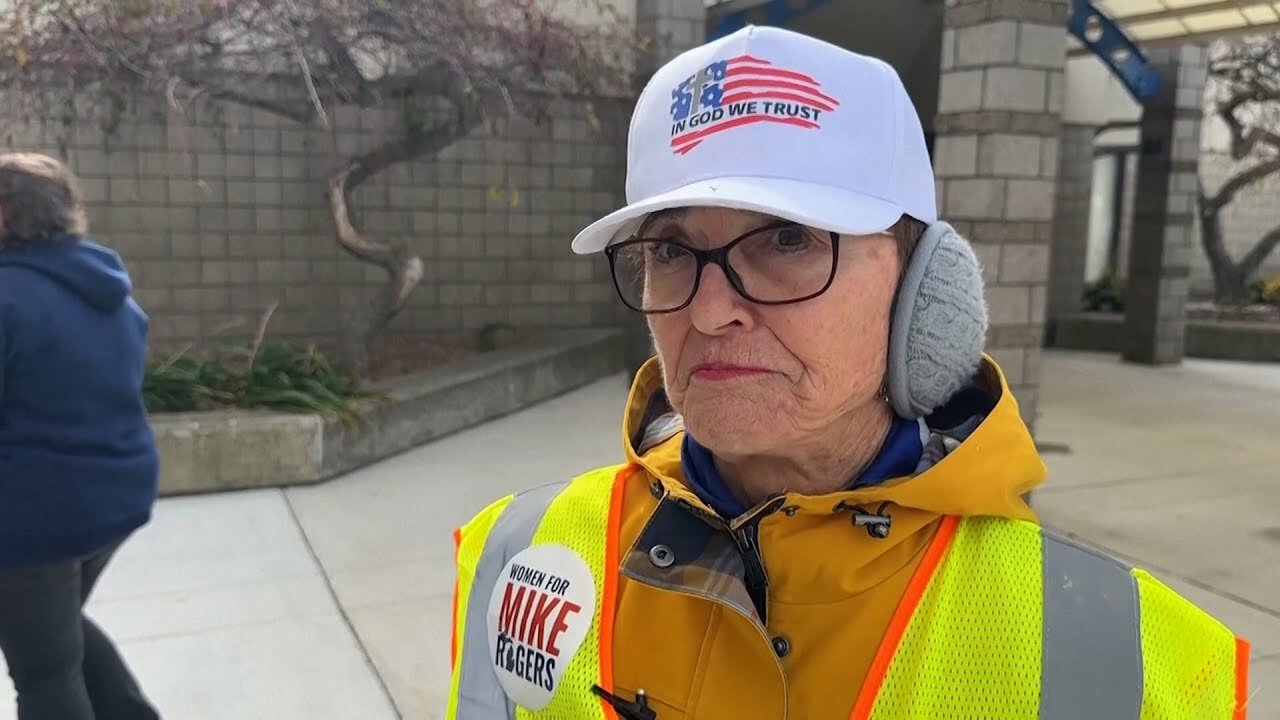 Michigan Trump supporters wear garbage bags and safety vests