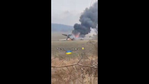 A downed Russian plane is on fire shot down by Ukraine Army.