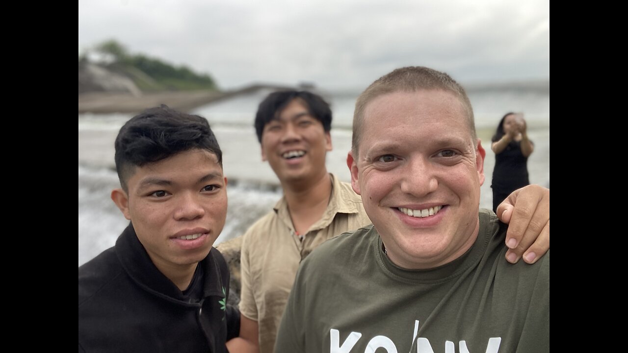 Drinking root moonshine in Trieu Phong , Vietnam