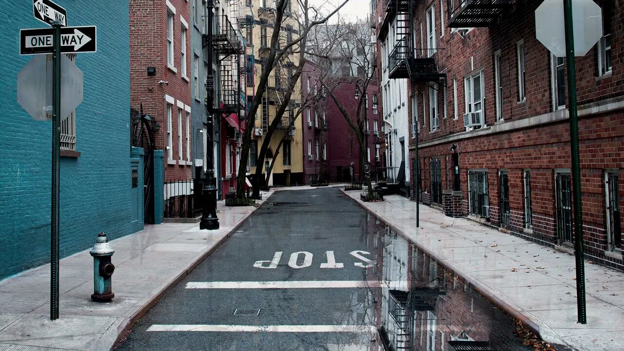 Rainfall on a puddle at Minetta street in Greenwich Village