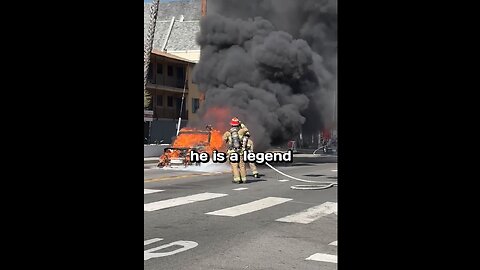 A Car Is Burning On The Street