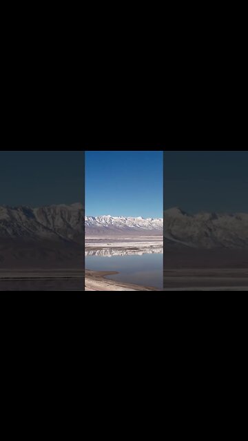 Camping in the winter has perks such as snowy mountains in every reflection.