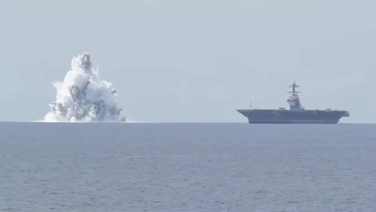 US Navy sets off massive, live explosives next to aircraft carrier