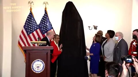 Democrats honor a statue.