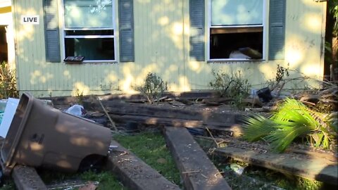 Damaged railroad and homes near the Caloosahatchee river