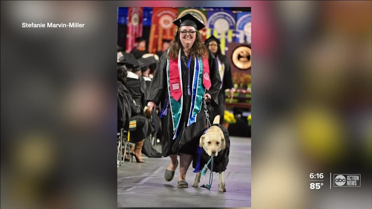 Army vet celebrates college graduation with beloved service dog