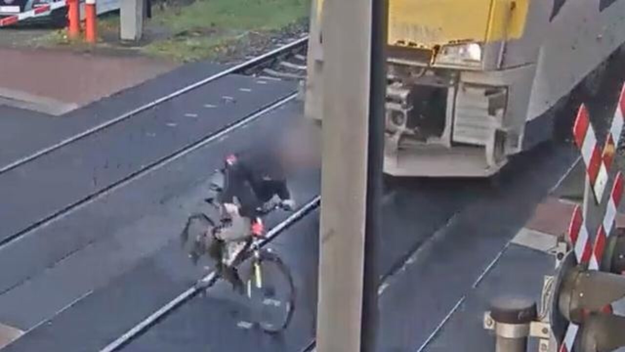 DUMBASS! Trying to Outrun a TRAIN on a Bicycle!