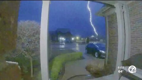 Caught on camera: Lightning strikes metro Detroit home, sparks fire