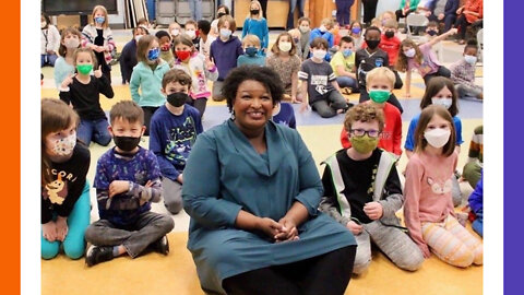 Stacey Abrams Maskless Among Masked Peasant Children