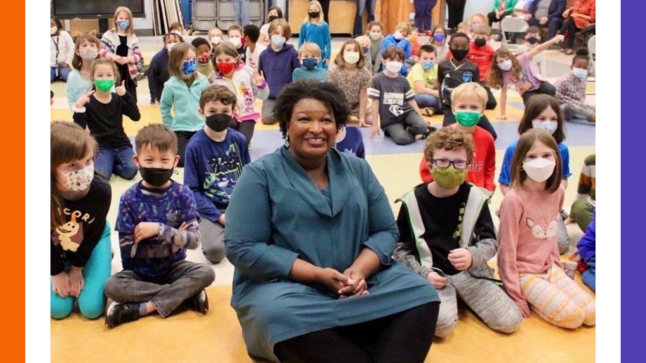 Stacey Abrams Maskless Among Masked Peasant Children