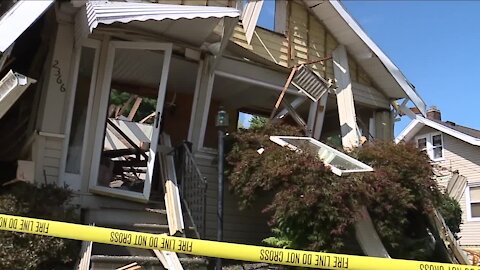 Neighbor rescues man after house explosion on Edwin Avenue in Akron