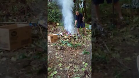 Tom Burning Yard Debris in a Area We Cleared by the Creek