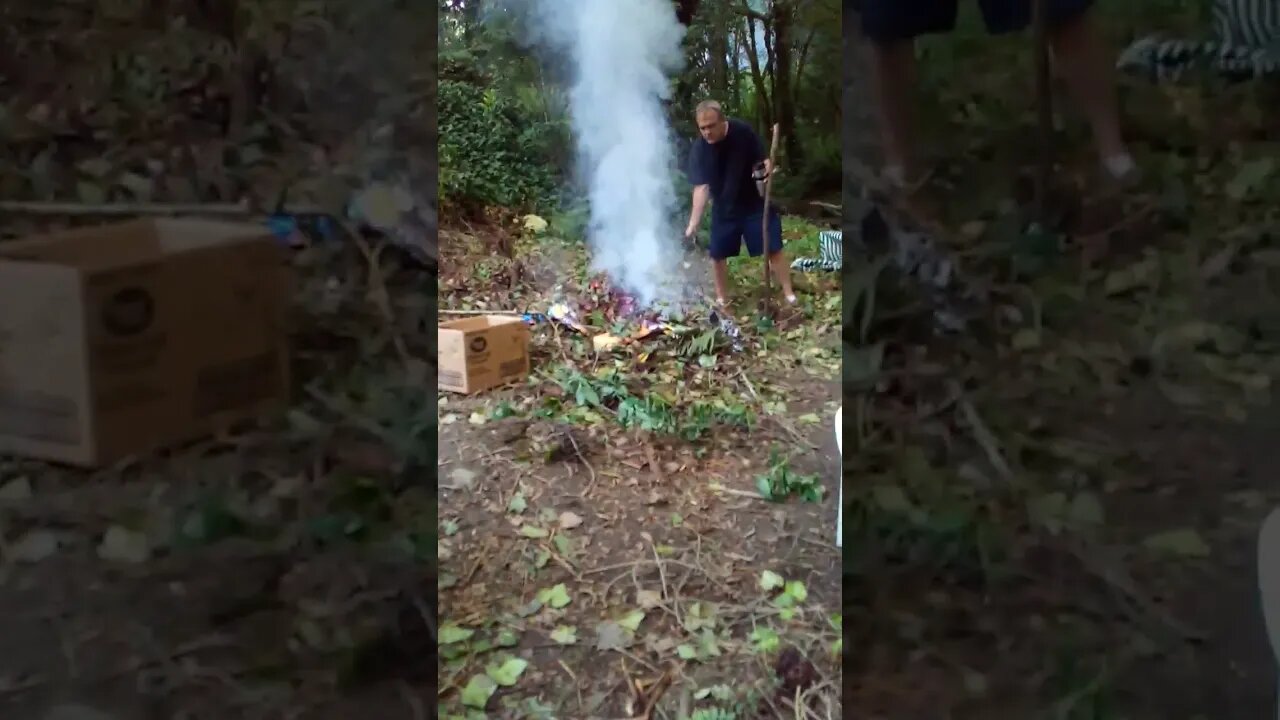 Tom Burning Yard Debris in a Area We Cleared by the Creek