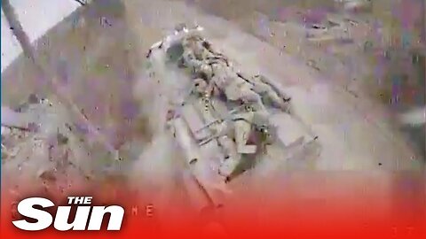 Ukrainian forces destroy Russian fighting vehicle carrying troops on its ROOF with Kamikaze drone