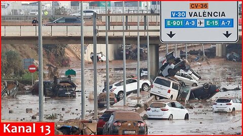 Marooned vehicles in Valencia after devastating floods kill at least 95