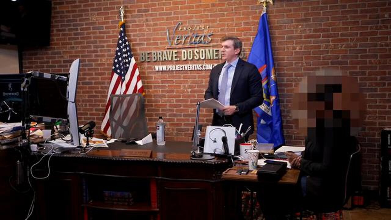 James O'Keefe addresses his staff in a staff meeting