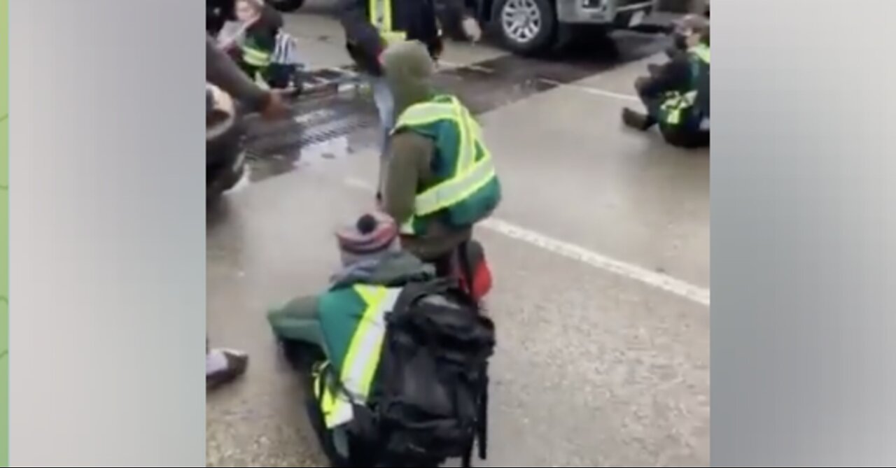 Vancouver Commuters Drag Climate Change Activists Out of The Street