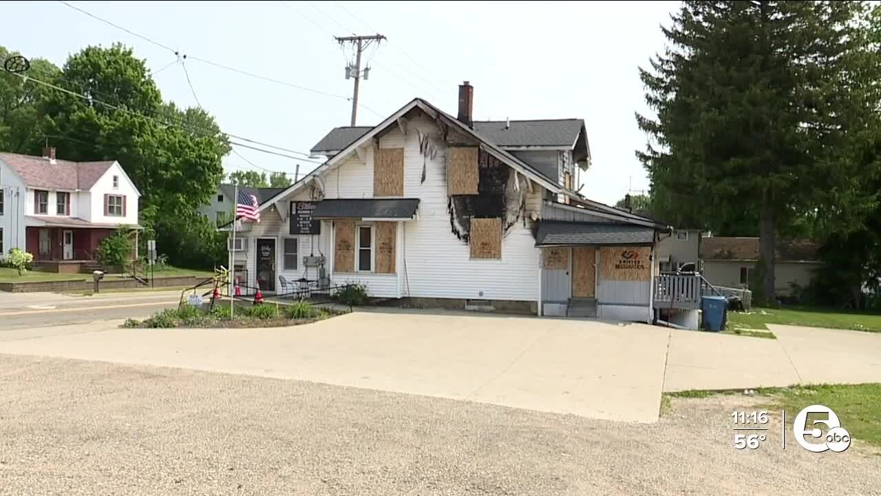 Green senior citizen escapes fire that damaged home, family barbershop