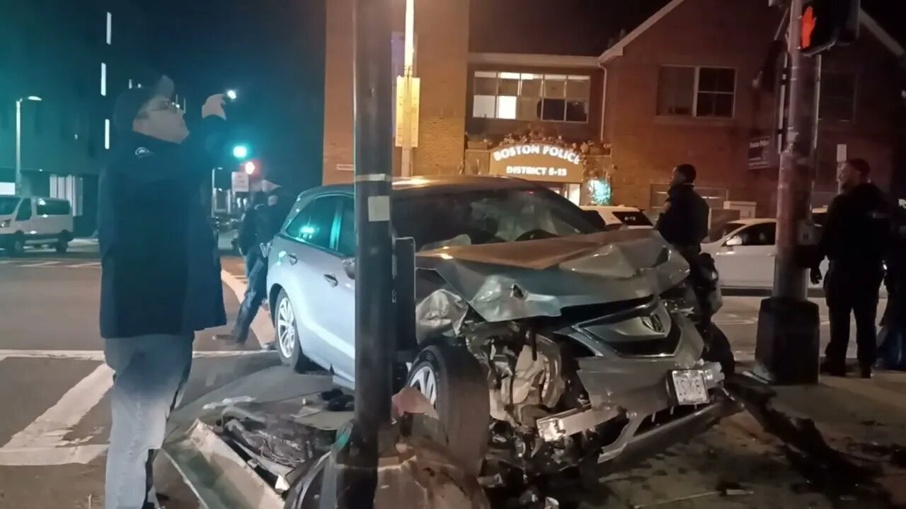 Boston police investigate a motor vehicle accident on Washington street.