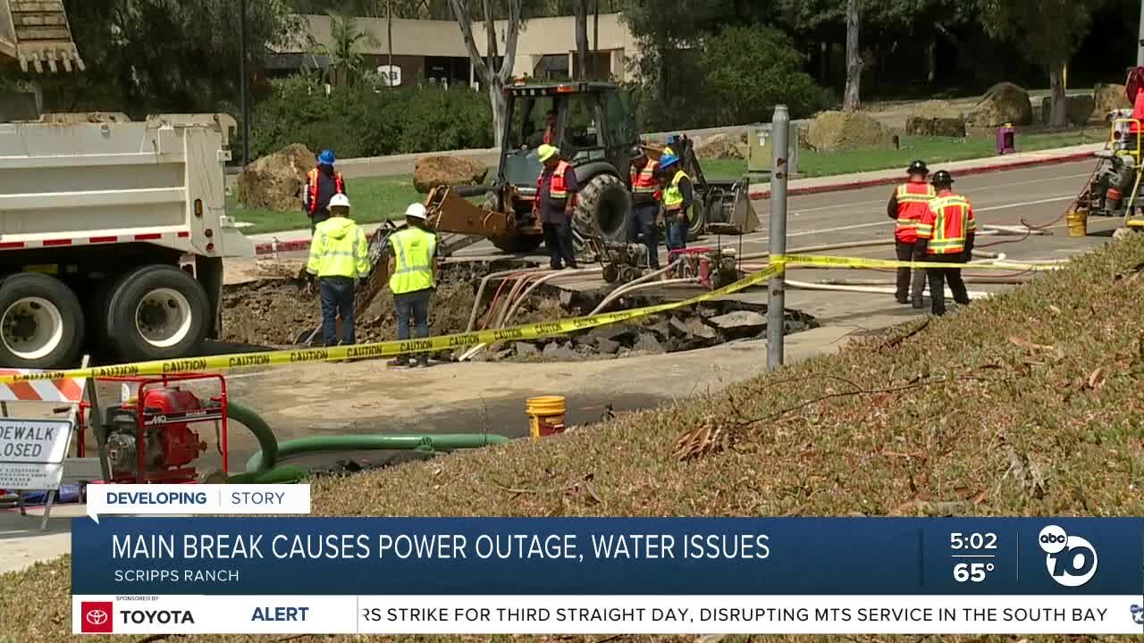 Water main break causes flooding, damages road