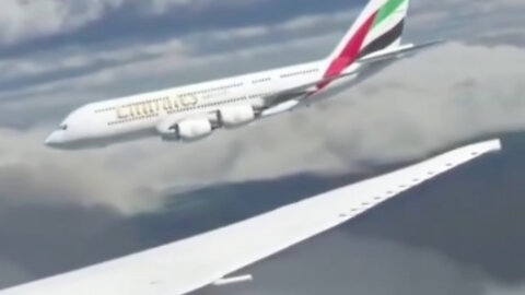 Two planes pass each other at a short distance