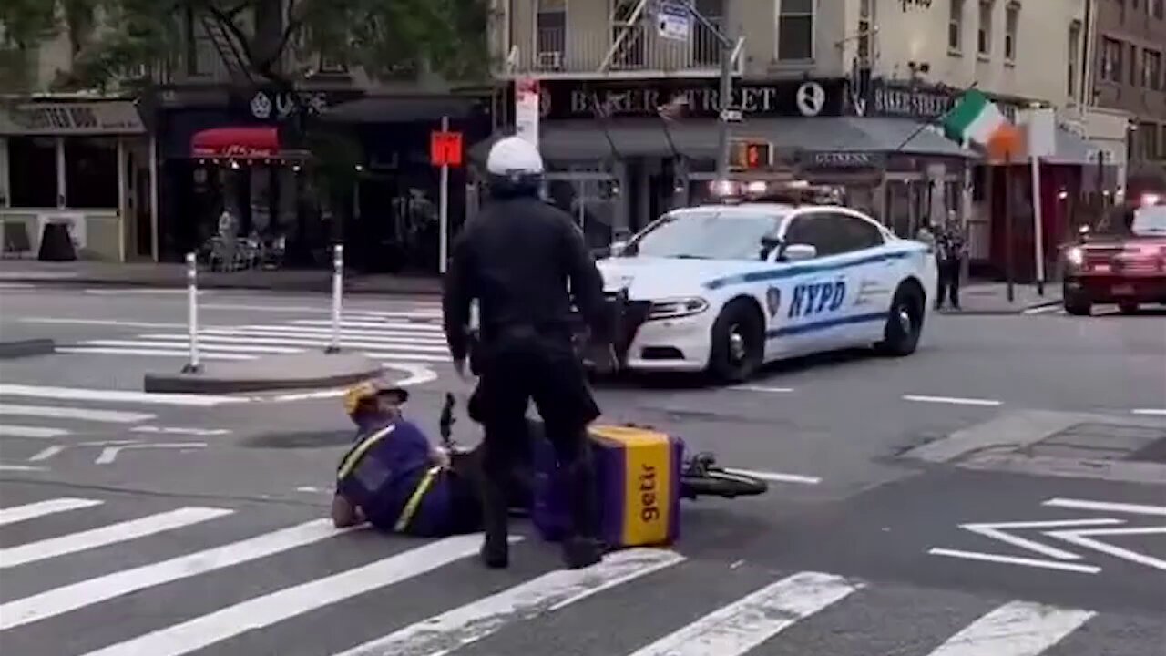 Delivery Driver Shoved Off his Bike by NYPD to make way for Joe Biden's Motorcade 🤕🚲👮