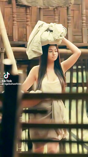 Exotic Beauty: The Allure of a Filipina stunning Filipina woman with captivating eyes and a radiantt