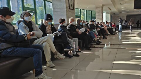 China reports 60,000 COVID-related deaths, says peak passed
