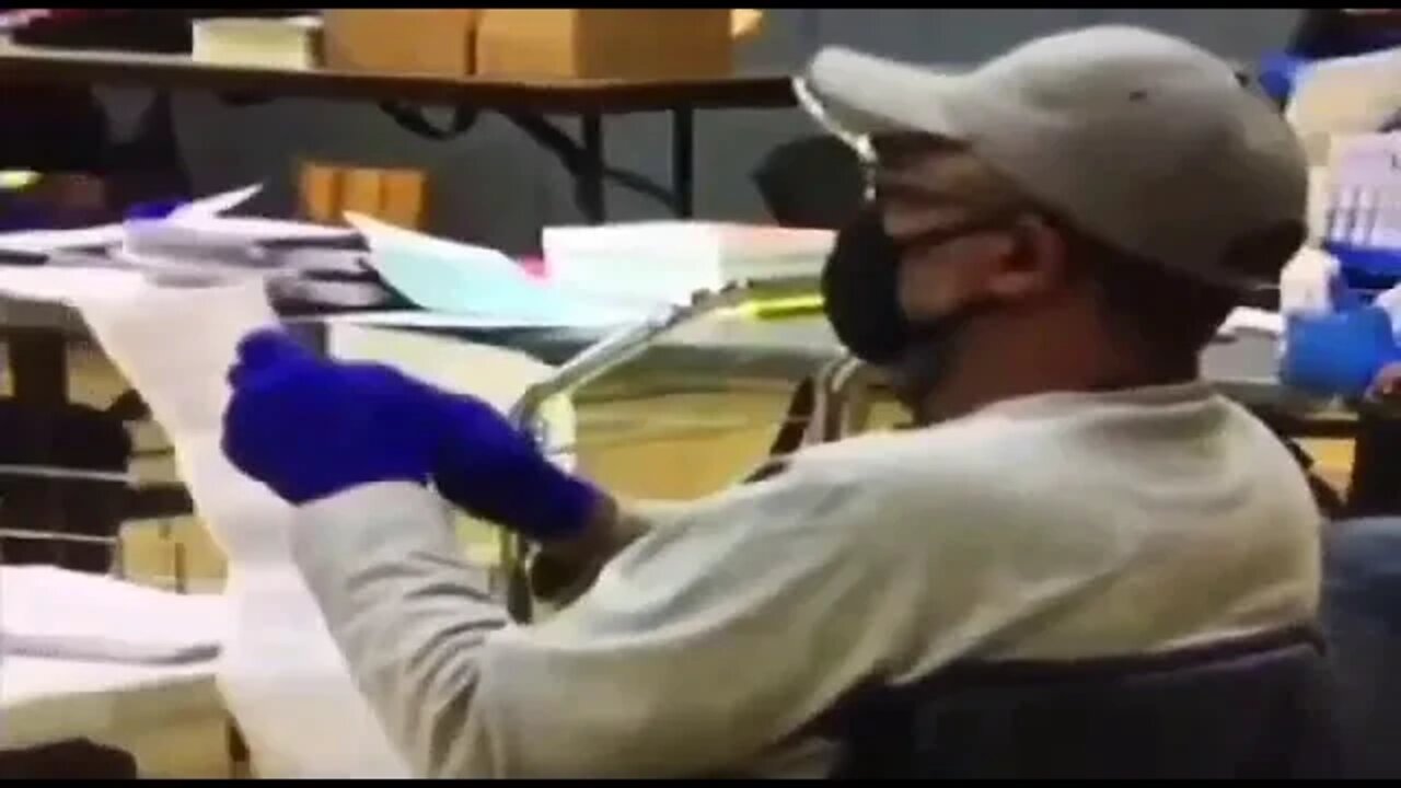 real sneaky dude altering ballots in secret 2020