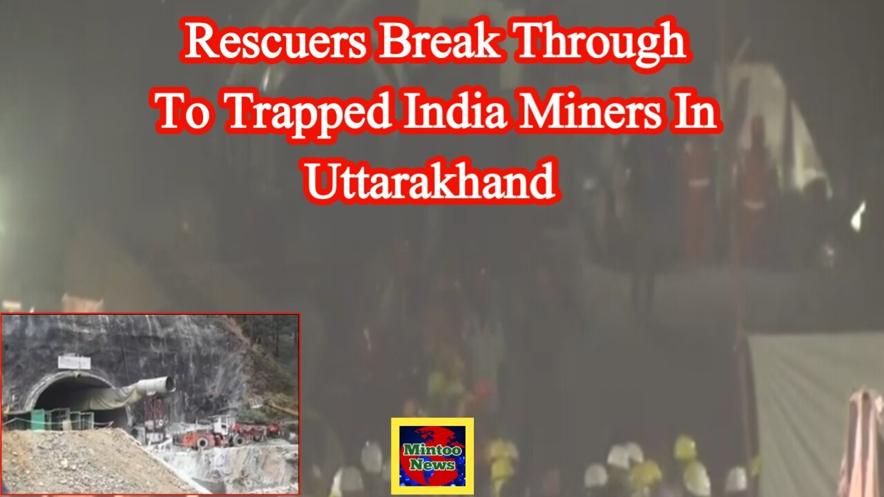 Rescuers break through to trapped India miners in Uttarakhand
