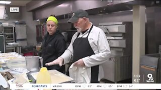 Volunteers prepare Christmas dinner for families in NKY