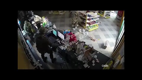 Russian paratroopers with a BMD 2 vehicle looting a gas station