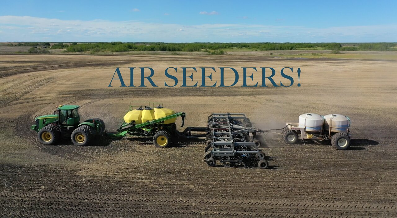Drone Footage of Tractors Pulling Large Air Seeders