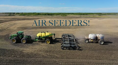 Drone Footage of Tractors Pulling Large Air Seeders