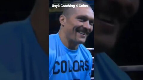 Usyk Catching Coins