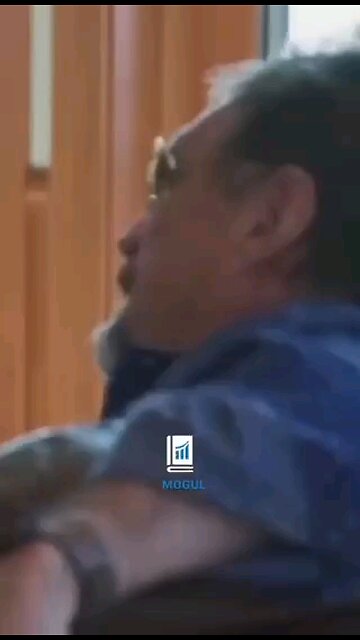 John McAfee discussing how he planted laptops in Governmental offices and obtained damning