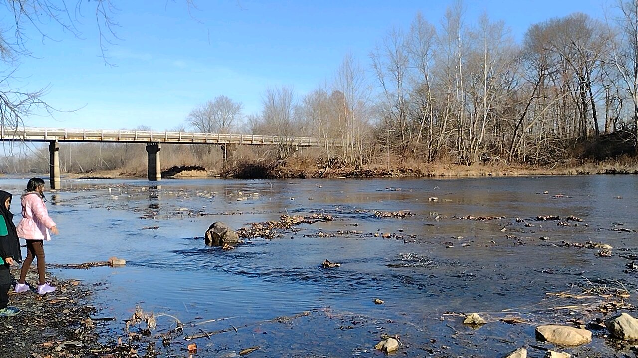 Rock skipping at a lake in Indiana