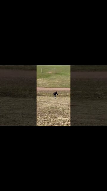 Longboarding down a grass hill