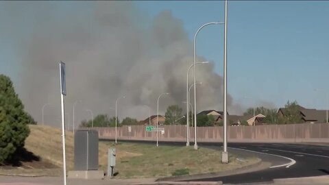Colorado Springs firefighters battle two wildfires, including one near airport
