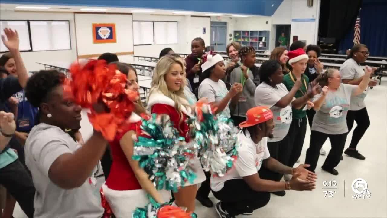 Miami Dolphins star visits 'Lunch Lady Squad' to celebrate cafeteria crew's success