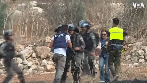 Israeli Forces Beating Press Reporter