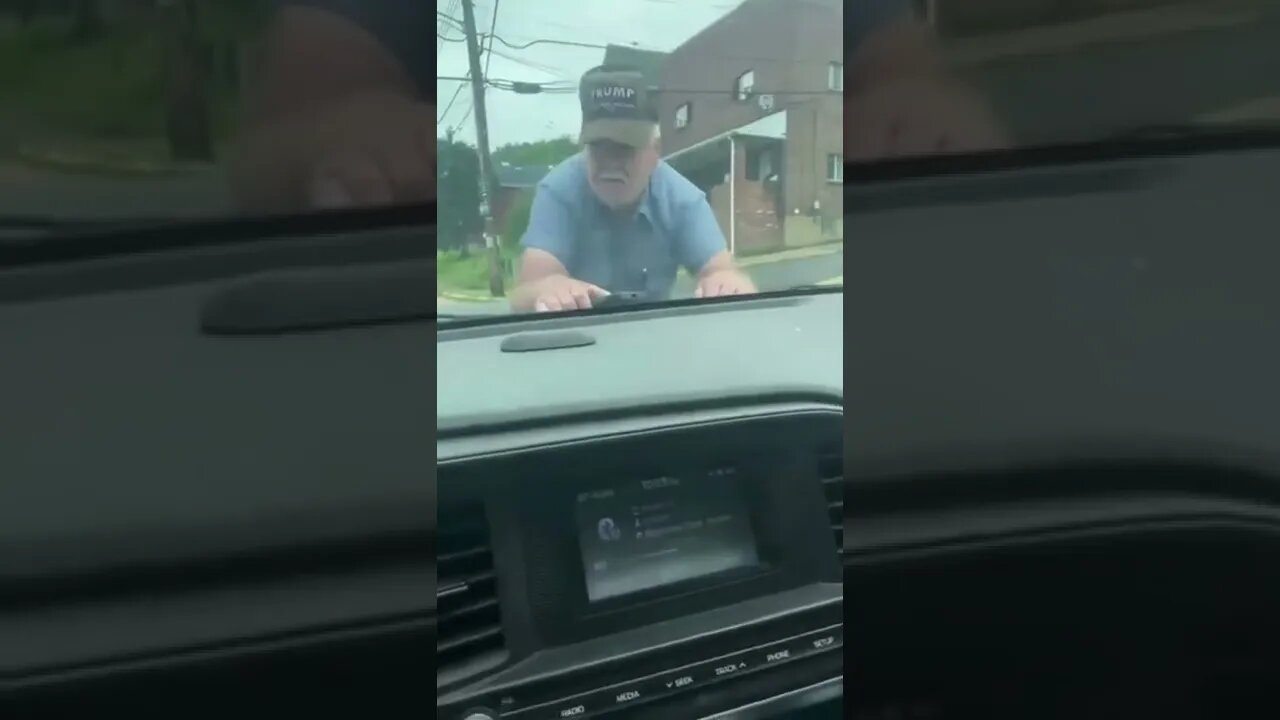 MAGA rally member will not get off of the car #shorts #MAGArally #weird
