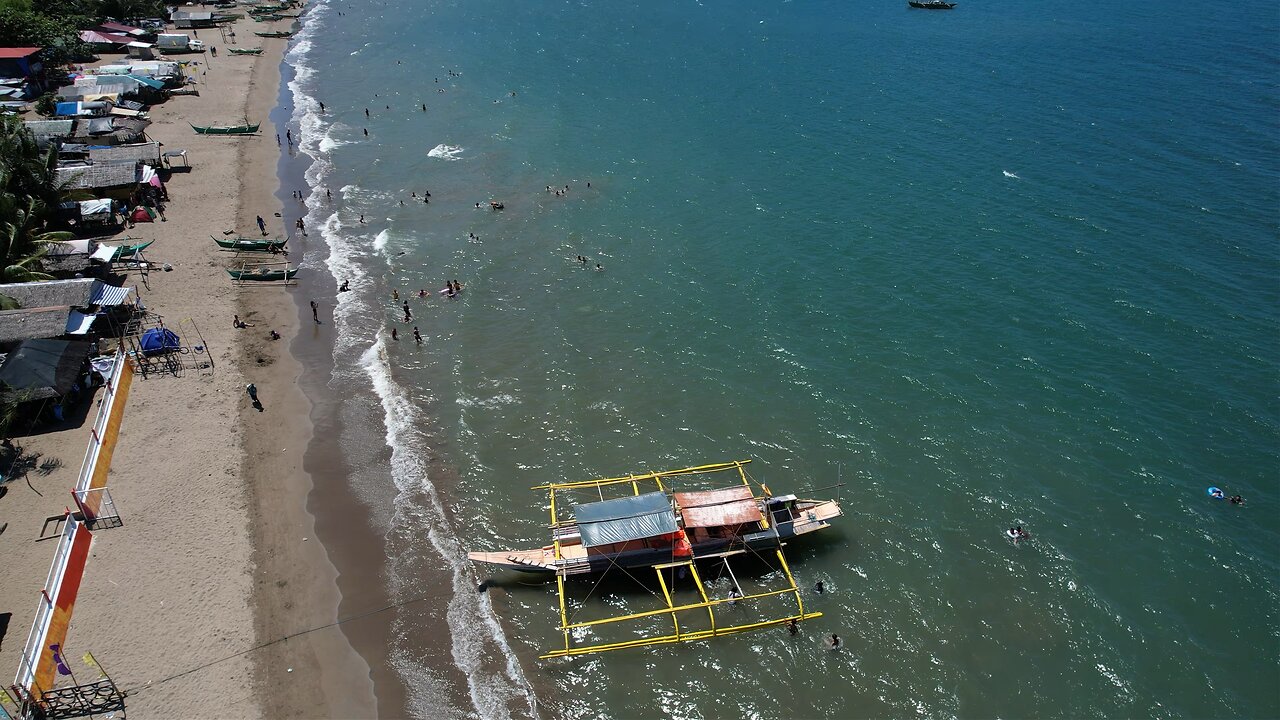 Flying by the tropical beach