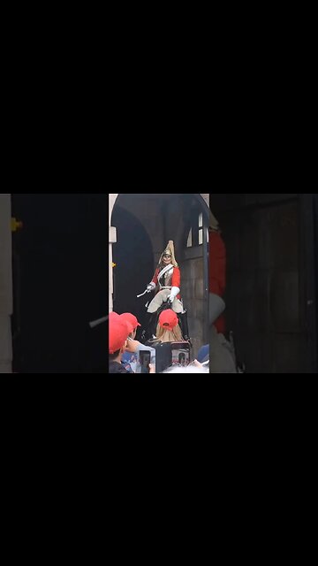 Kings guards horse freaks out over workmen drilling both front legs slip guard stays on.