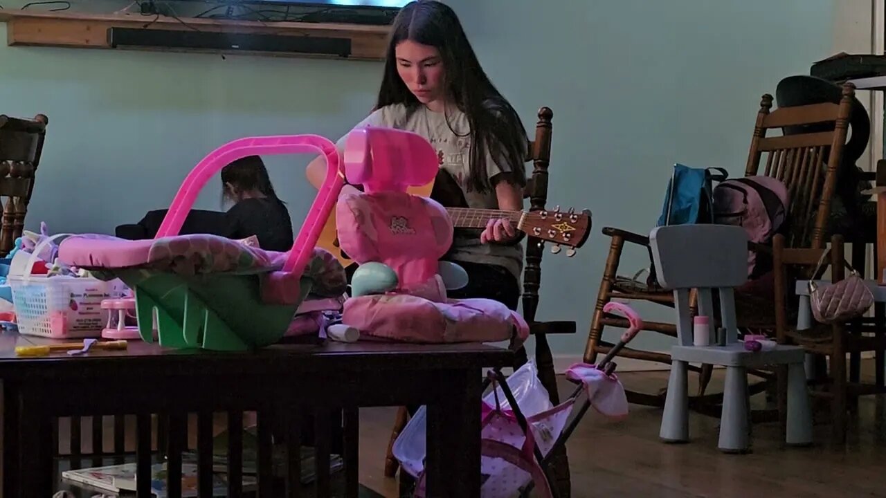 Punkin learning the guitar